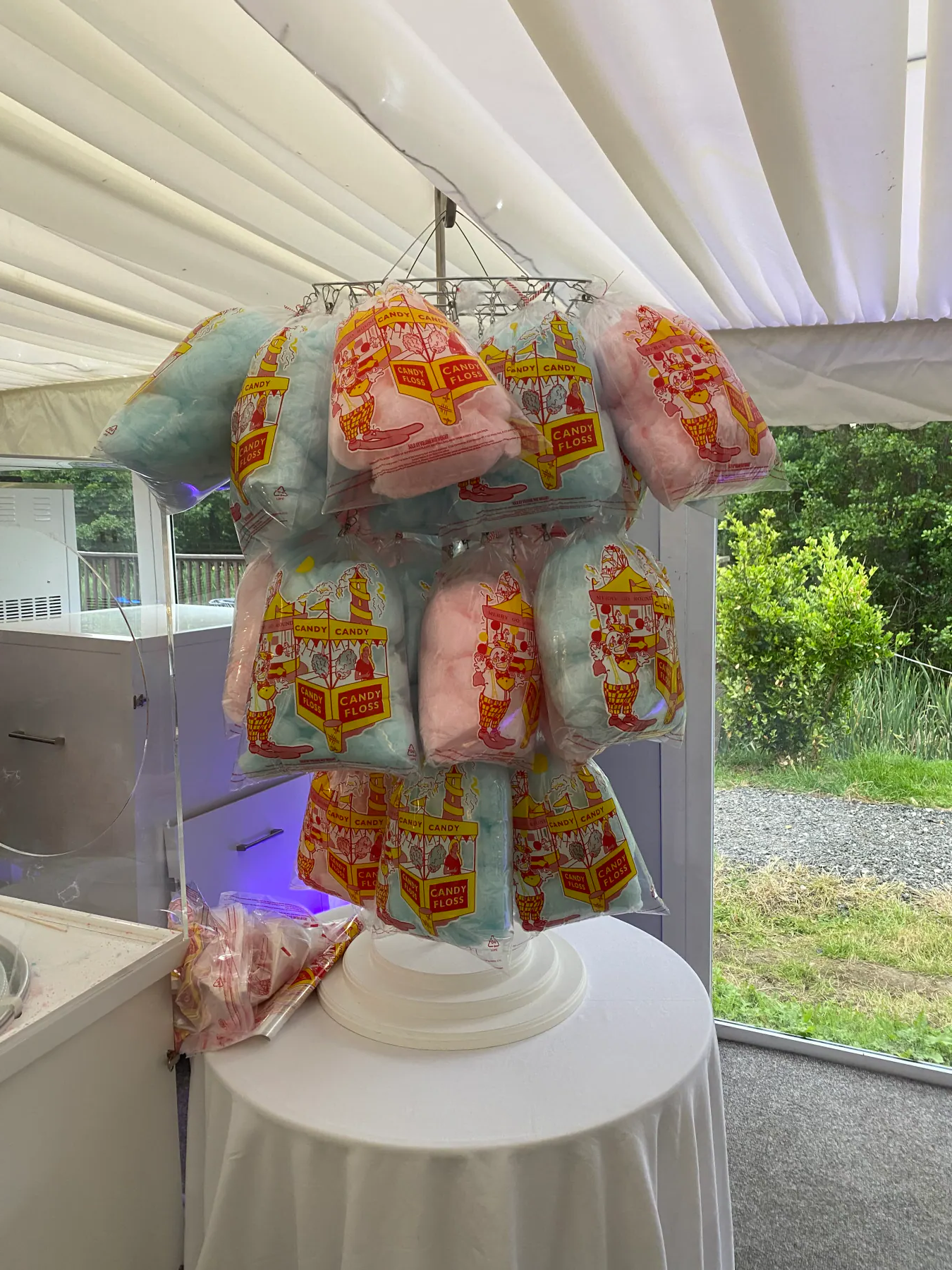 Bags of pink and blue candyfloss ready for an event